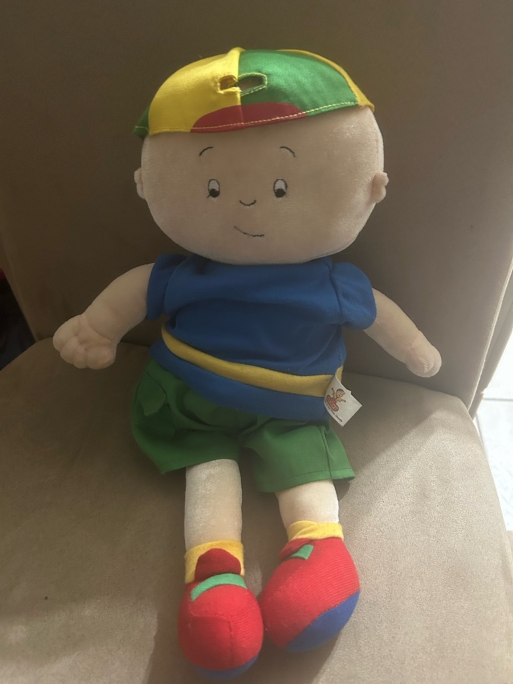 Plush Caillou Doll with Colorful Cap and Green Shorts - Multicolor